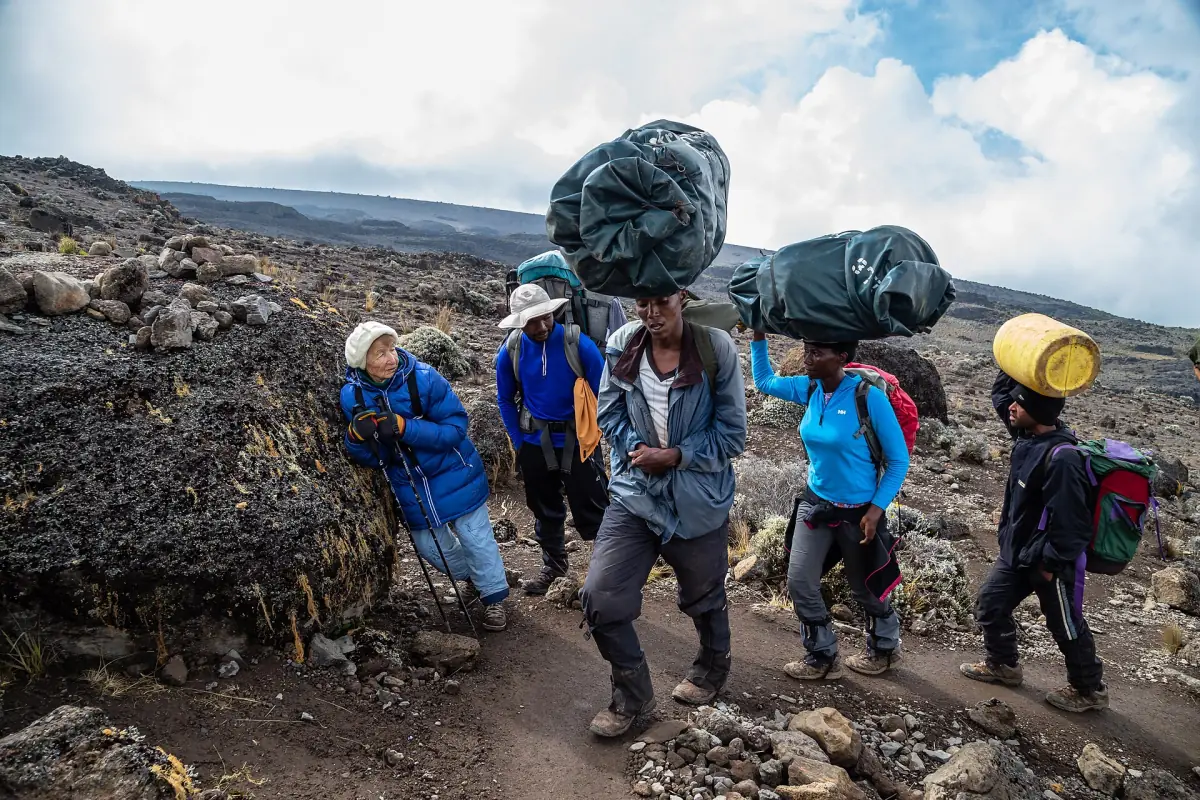Porters on the rocky high trail